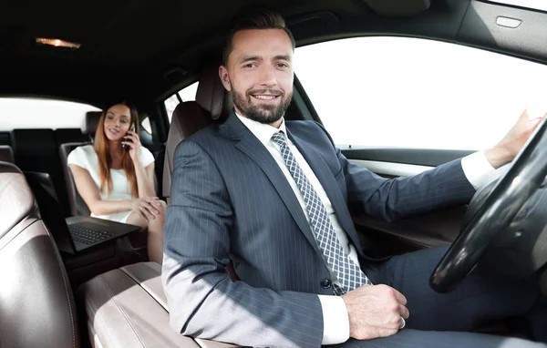 depositphotos 171078322 stock photo attractive elegant serious man drives